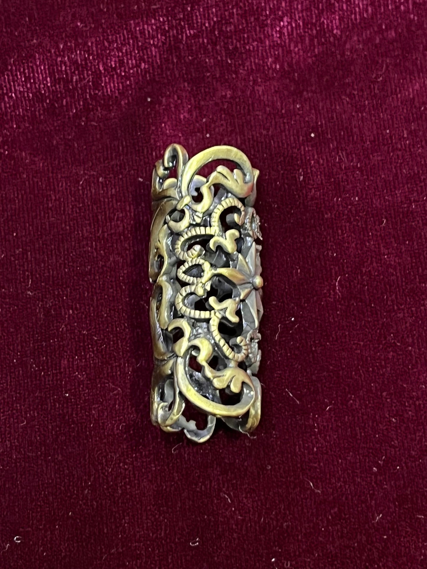 Metal Tube holders on garments, Metal Tube buckle, Metal Buckle, Heavy weight Floral Motif buckles.