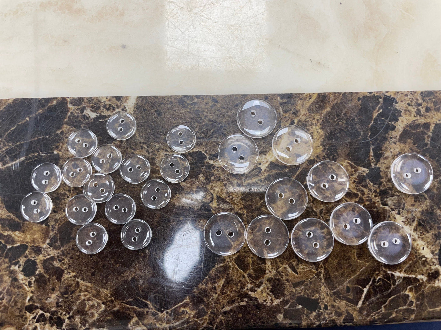 Clear buttons, shirt buttons, jigger buttons, blazer buttons, dress buttons, buttons, 20l button, 28l buttons.