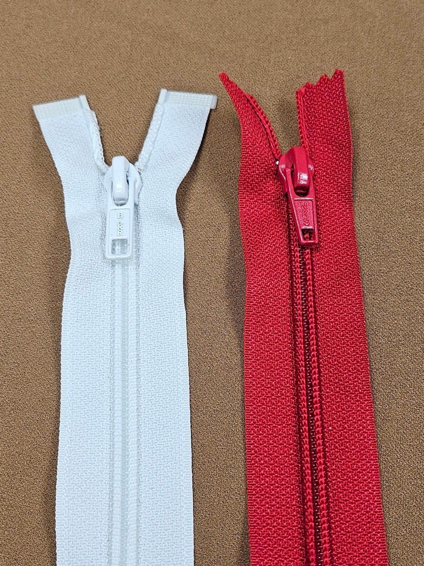 17" Open-ended zips, plastic teeth, metal zip slider/puller (B)