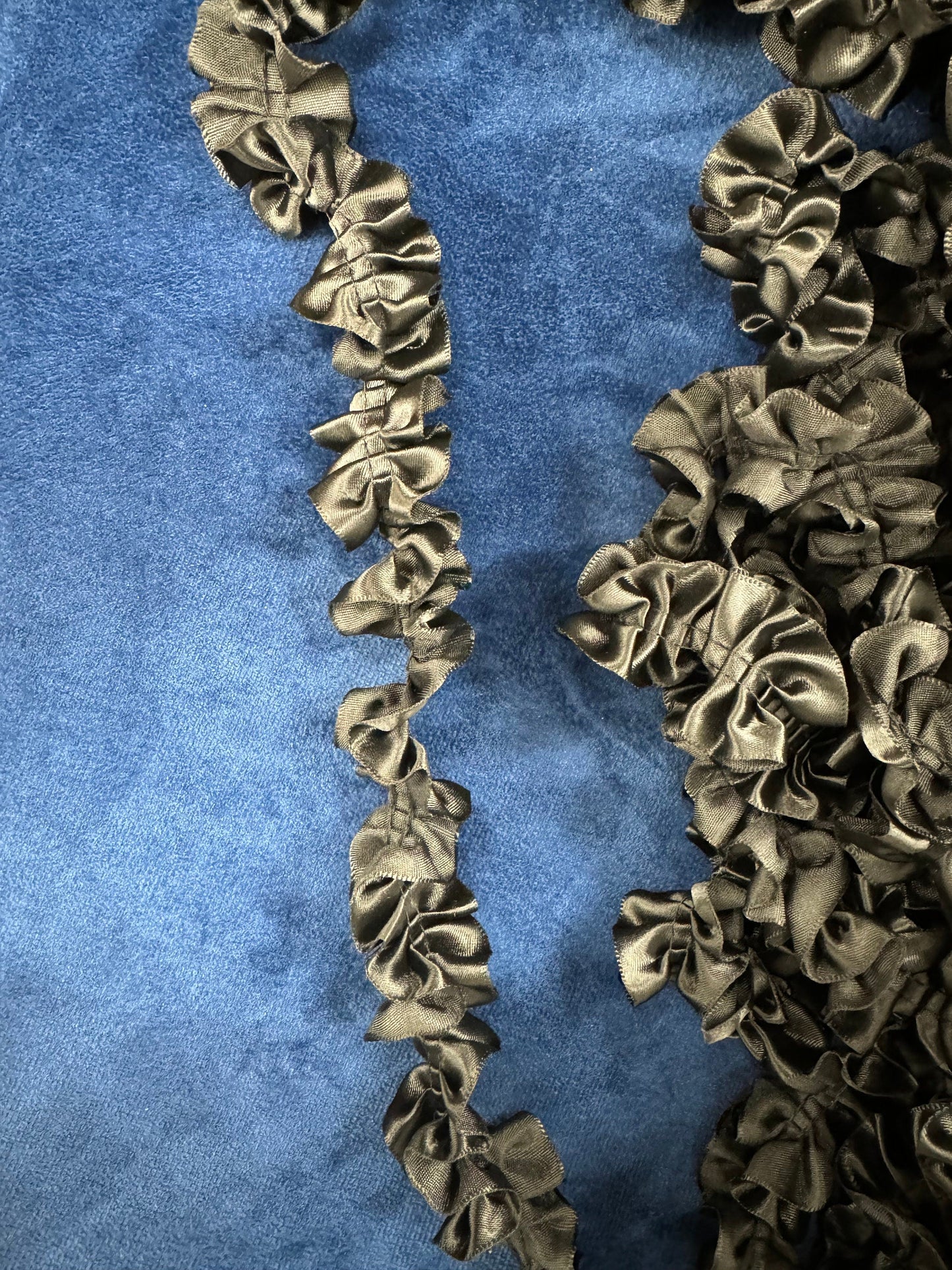 Black pleated trim, pleated ribbon, gathered ribbon. Black ribbon