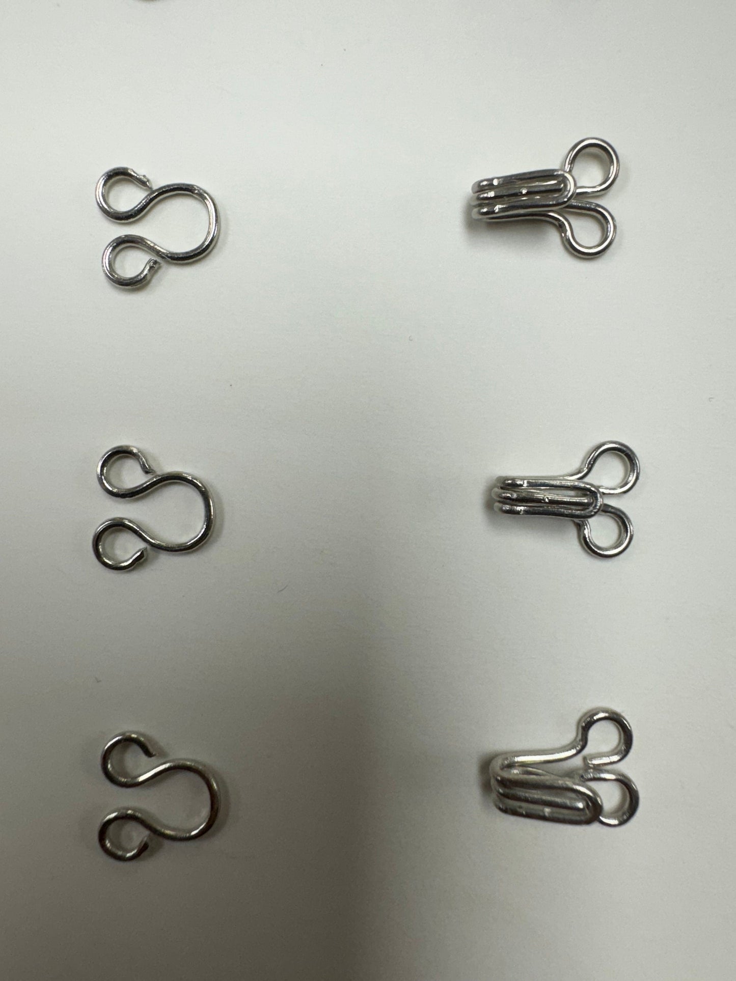 Hook and eye, hooks and eyes, fastening hook and eye, garment fastening, loose hook and eye