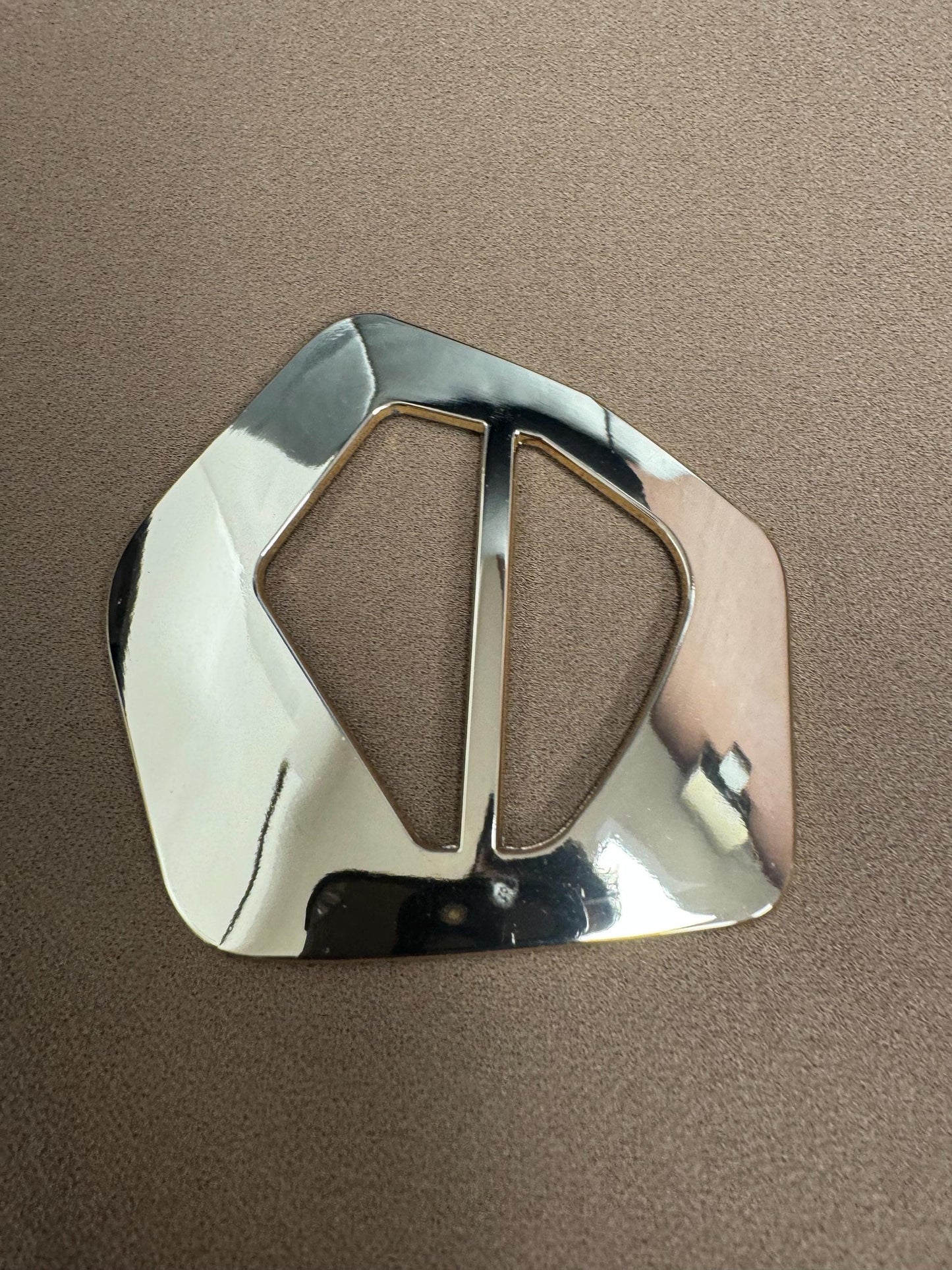 buckle, odd shape buckle, designer buckle, gold buckle