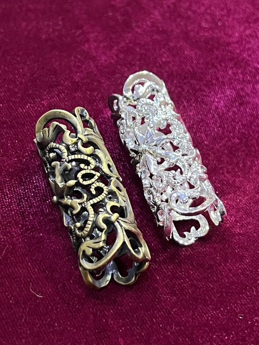 Metal Tube holders on garments, Metal Tube buckle, Metal Buckle, Heavy weight Floral Motif buckles.