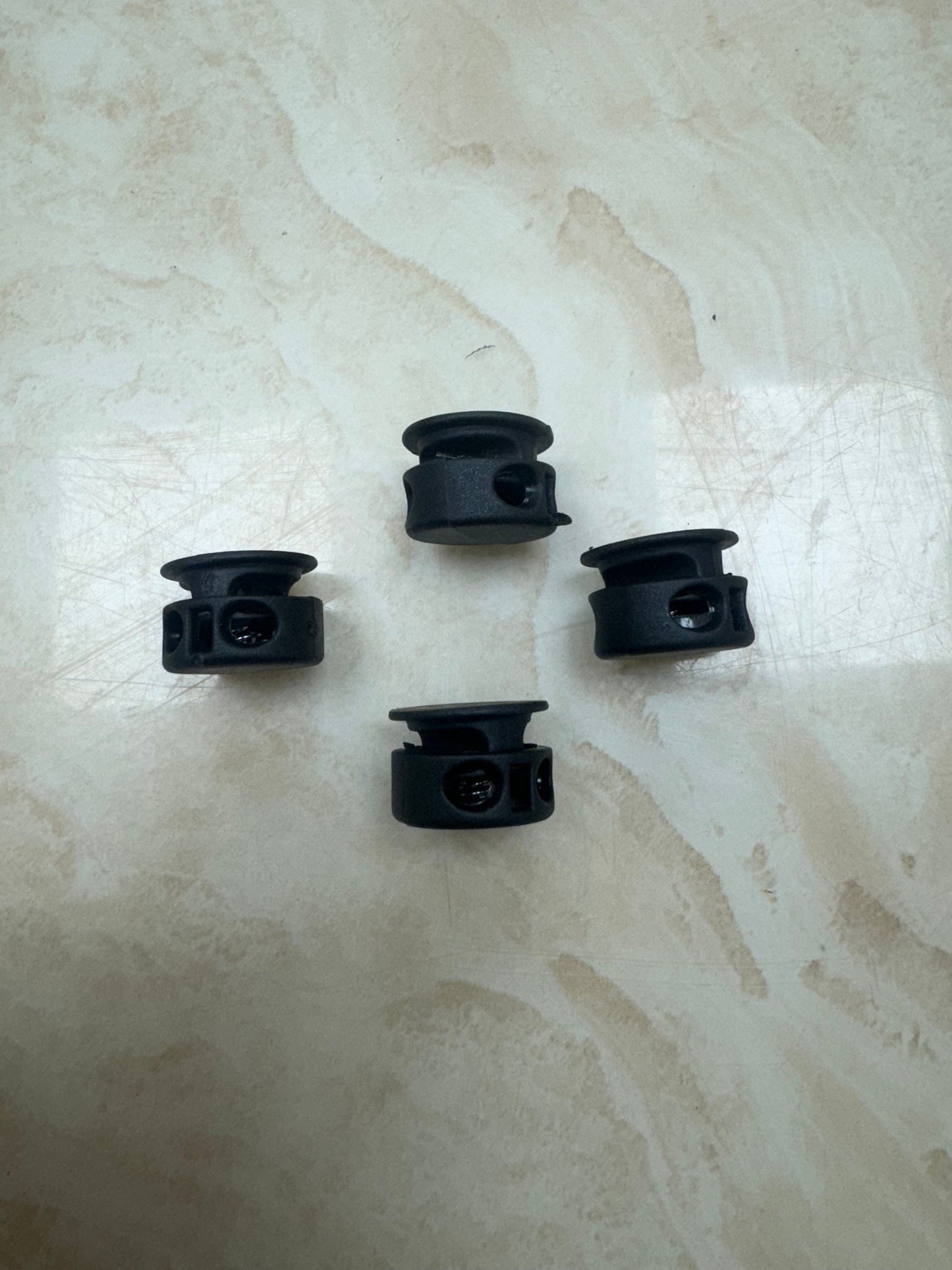 Spring loaded toggle, toggles, black toggles, spring toggles, toggle, shock cord toggles, jogger toggles