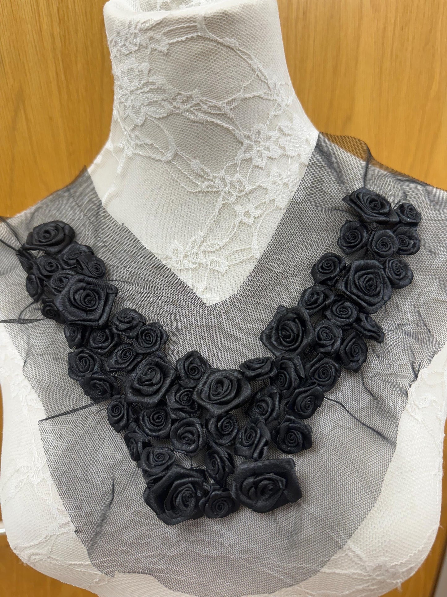 corsage necktrim, corsage trim, flower trimming, black flowers