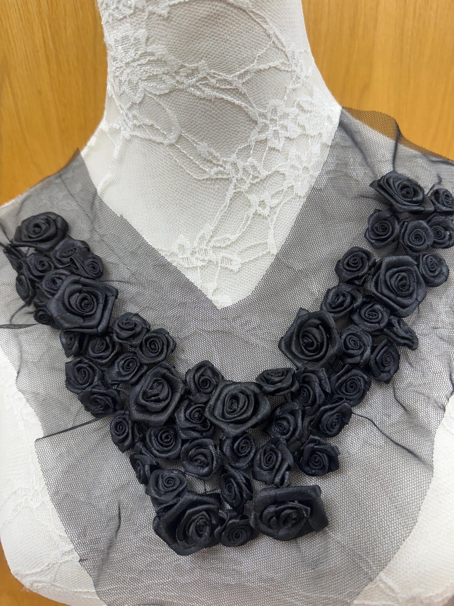 corsage necktrim, corsage trim, flower trimming, black flowers